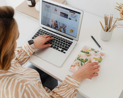 a woman working on a laptop