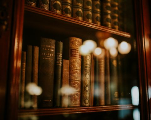 books in glass bookcase