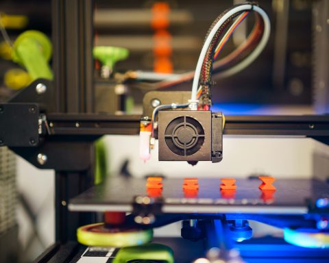 a close up of a machine with wires attached to it