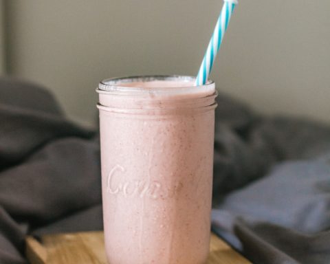 clear drinking glass with white liquid