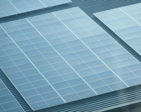 Detailed view of solar panels installed on a rooftop, showcasing green energy.